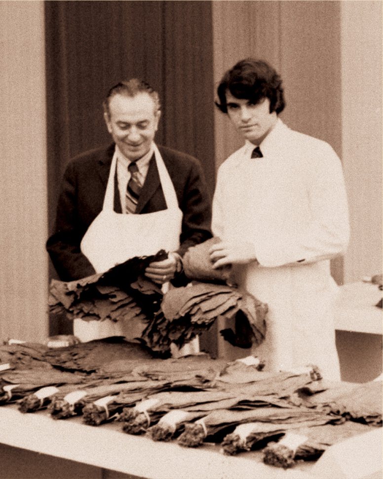 Archive photo: Newman family members sorting tobacco